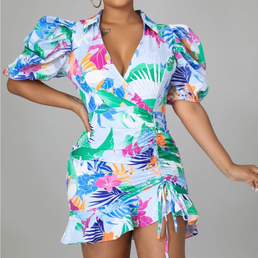 Multi-colored semi stretched dress. Worn once (Small)